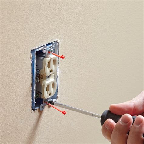 electrical outlet box screw hole stripped|electrical outlet box repair clips.